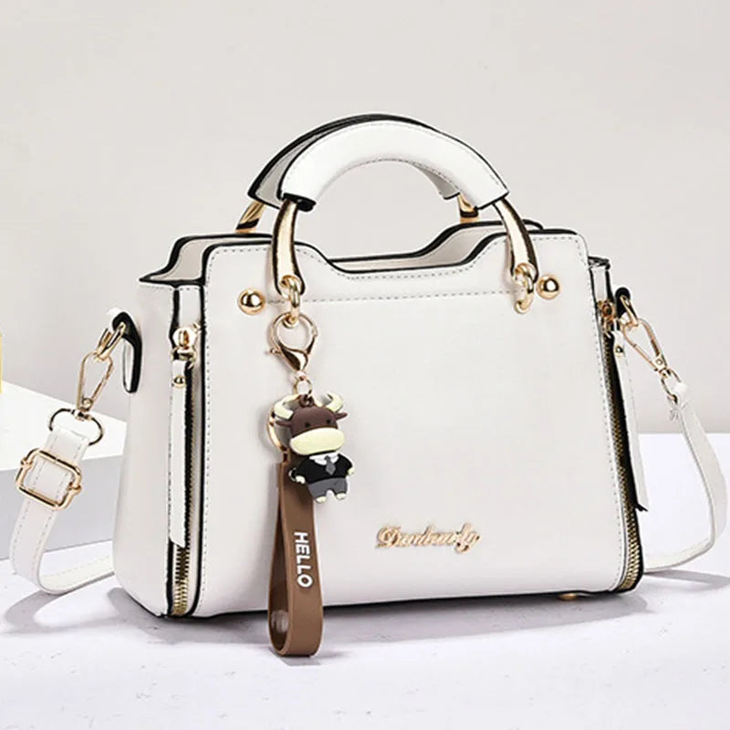 Printed monogram straddle leather bag. - Maison Novaire #