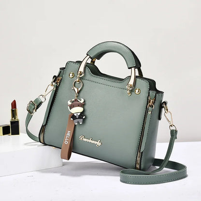 Printed monogram straddle leather bag. - Maison Novaire #