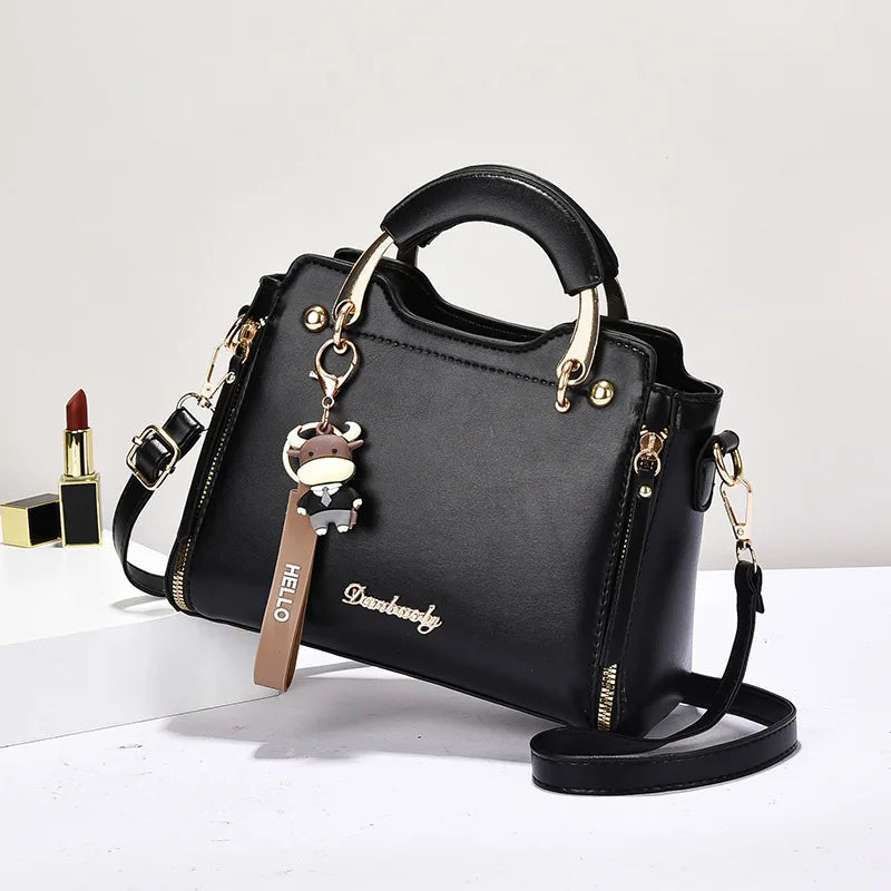 Printed monogram straddle leather bag. - Maison Novaire #