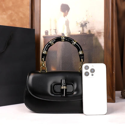 Die neue Bambusgelenk-Handtasche 2025 ist eine vielseitige und hochwertige kleine Umhängetasche für Damen